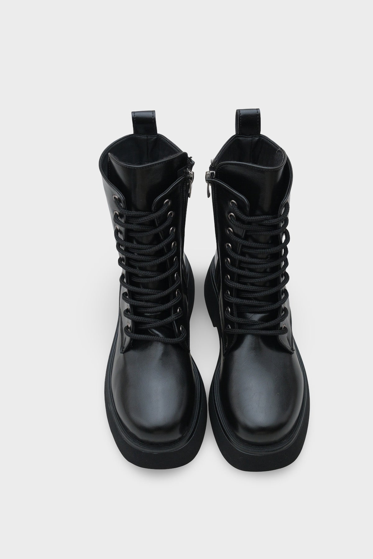 Melessa Yuvarlak Burunlu Yandan Fermuarlı Trak Tabanlı Kadın Bot