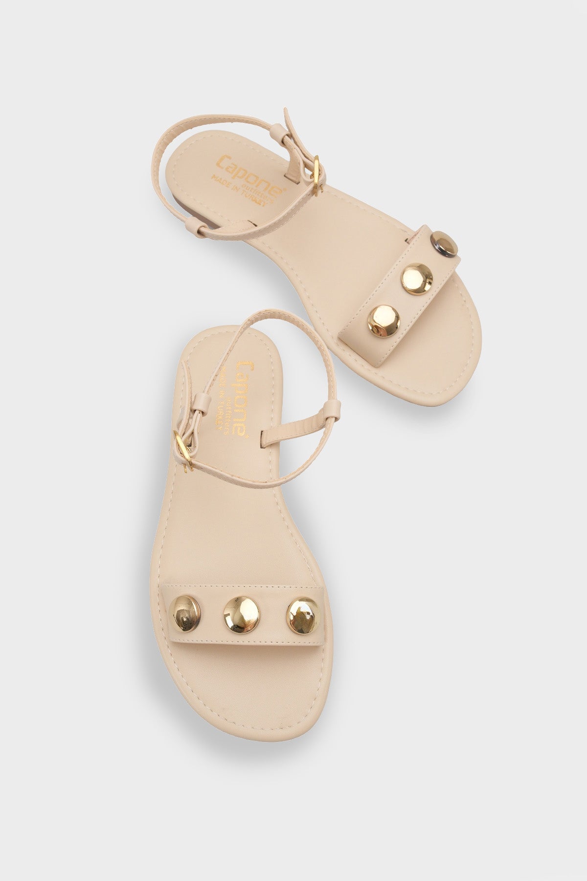 Celina Tek Bantlı Metal Aksesuarlı Bilekten Bantlı Düz Topuklu Yuvarlak Burunlu Kadın Sandalet