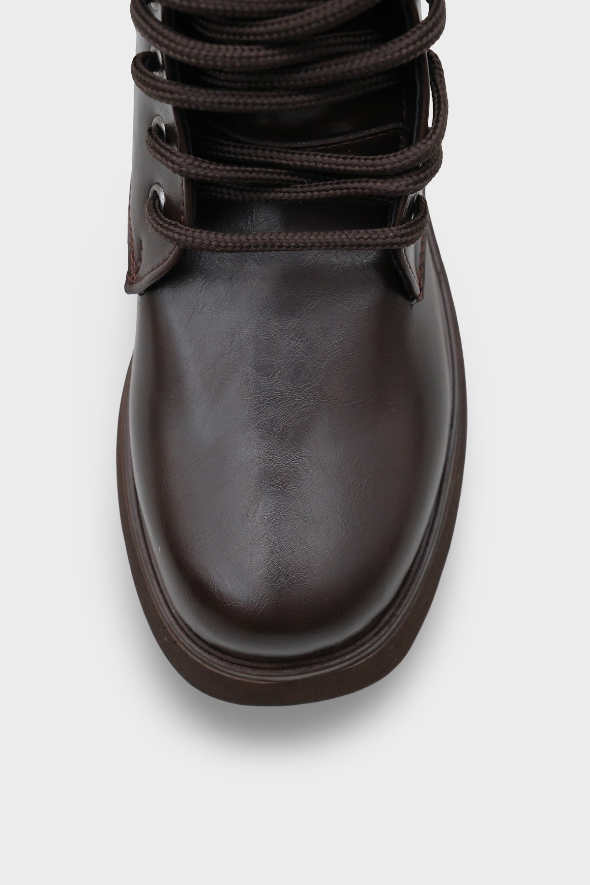 Melessa Yuvarlak Burunlu Yandan Fermuarlı Trak Tabanlı Kadın Bot