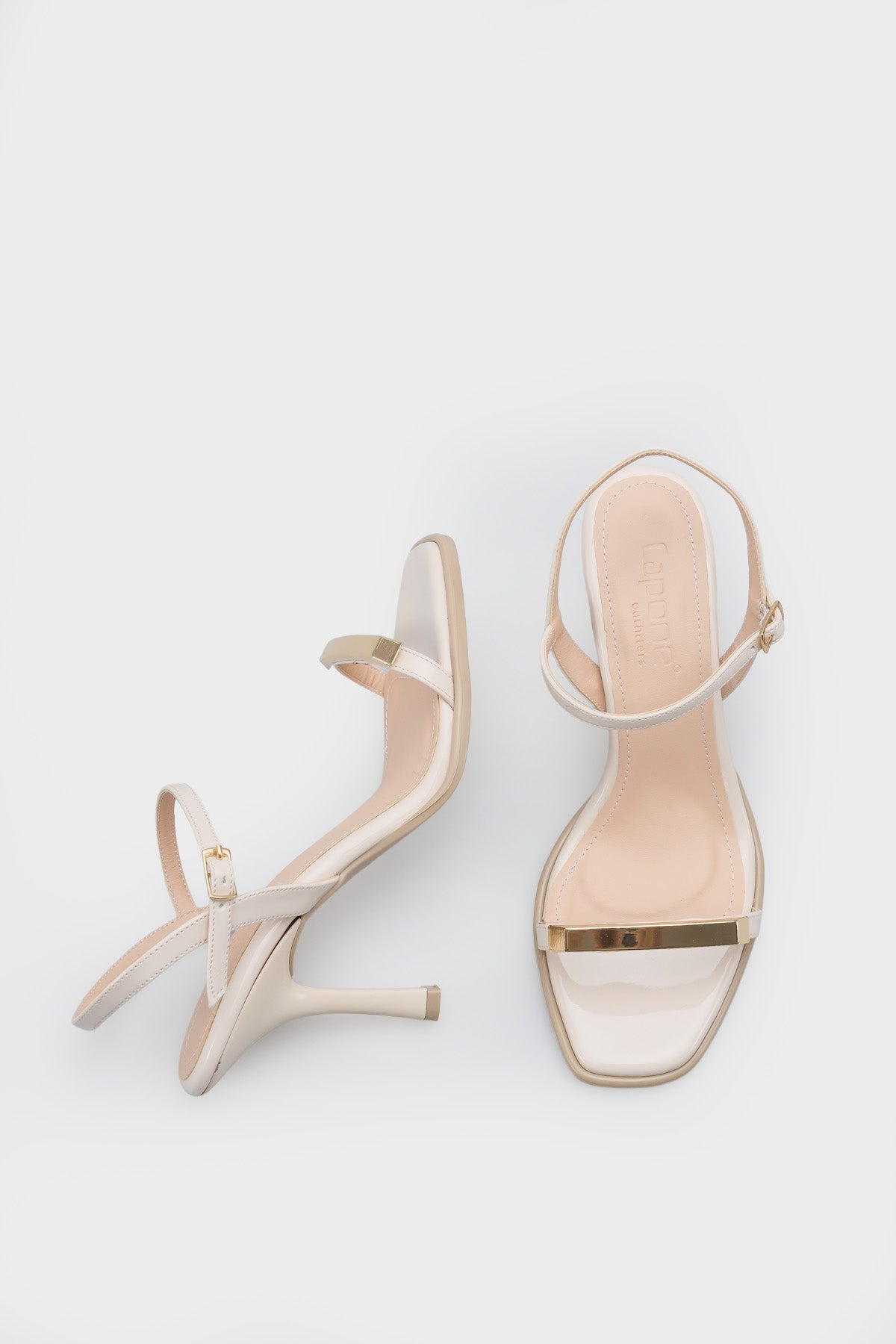 Reggi Küt Burunlu Metal Tek Bantlı Orta Topuklu Bilekten Bantlı Kadın Ayakkabı